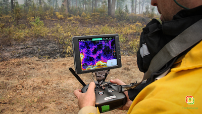 Regional Fire Mapping Image A researcher flies a custom UAV with an attached thermal camera used to map fire intensity at Tall Timbers Research Station. Photo: David Godwin, Southern Fire Exchange / University of Florida.